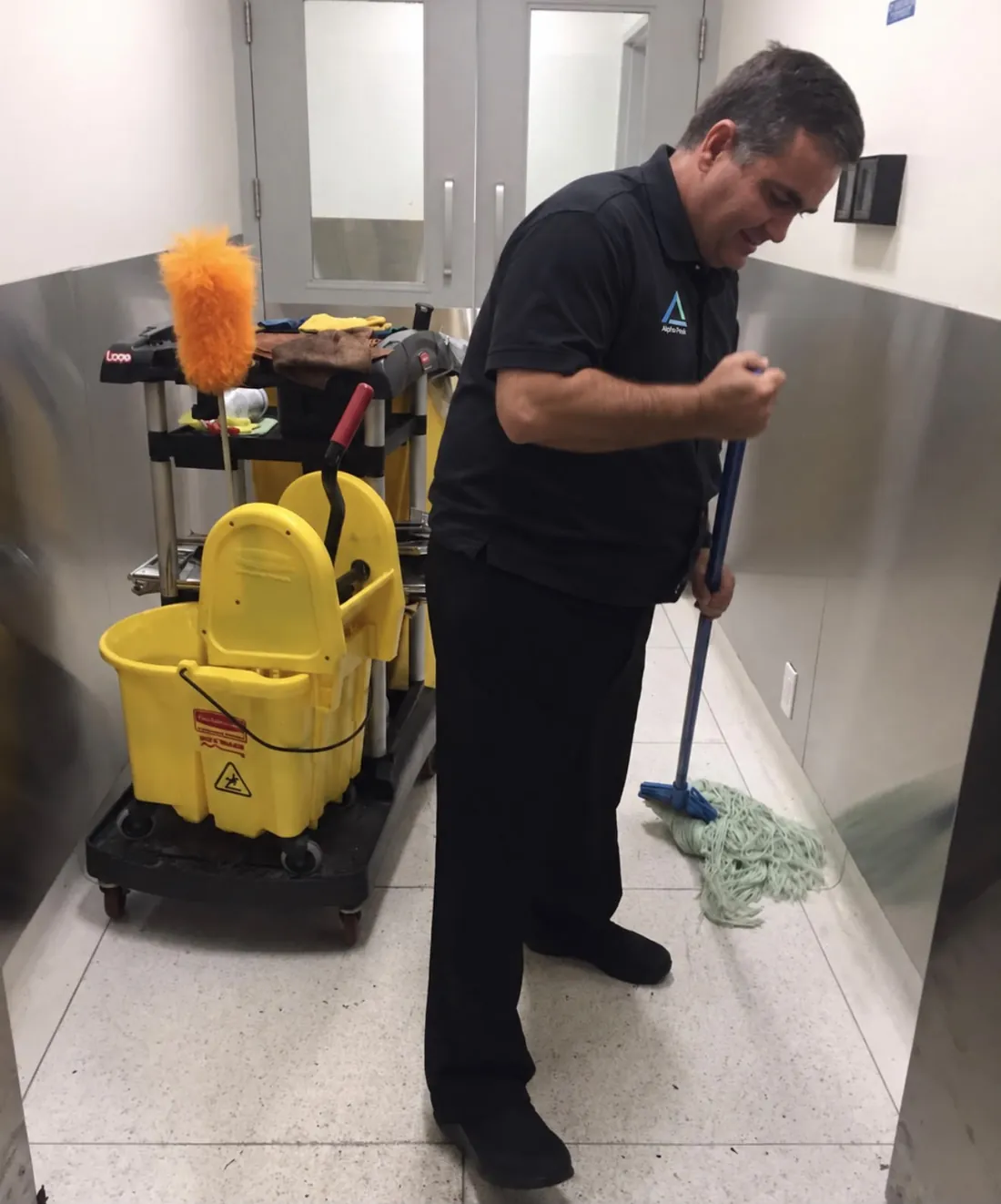 An Alpha Peak cleaner at work in uniform
