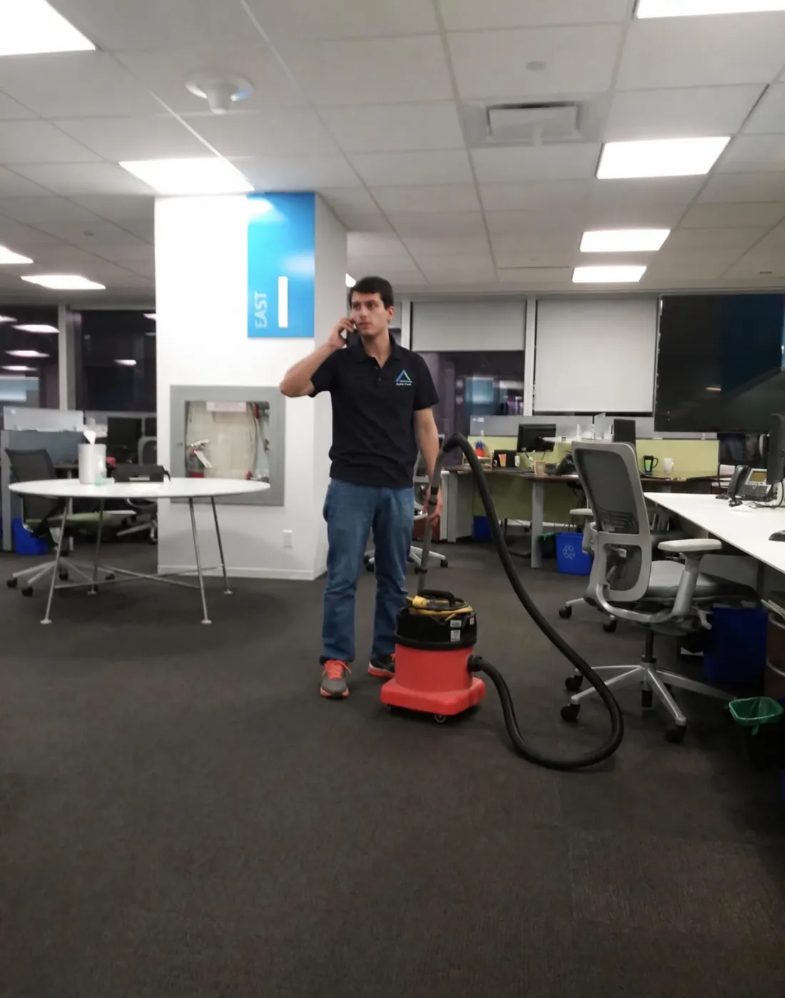Vacuuming an open-plan office